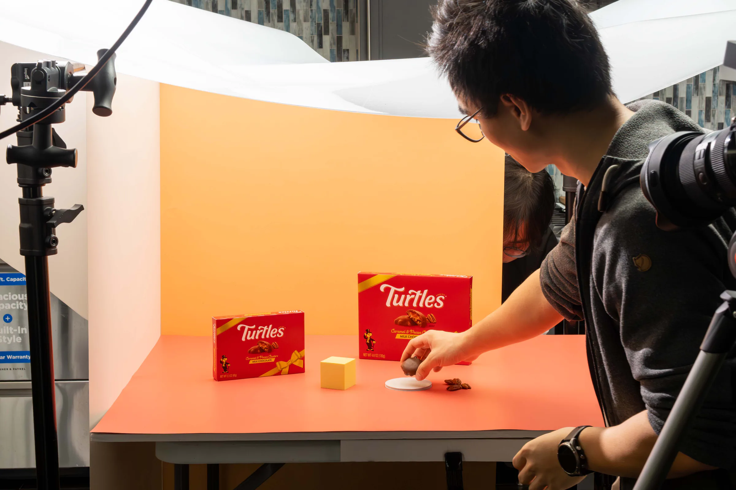 Styling Turtles packs on an orange set in the Rush photo studio