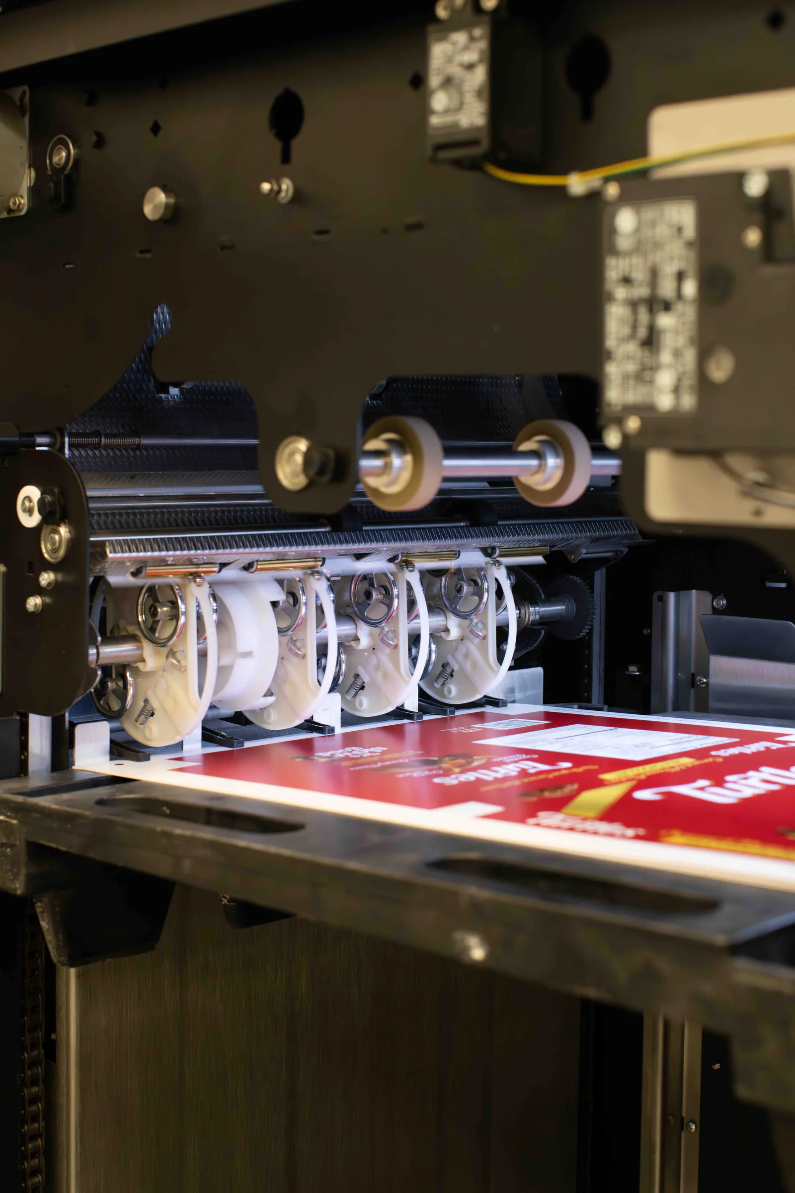 A sheet of Turtles boxes coming off the digital press